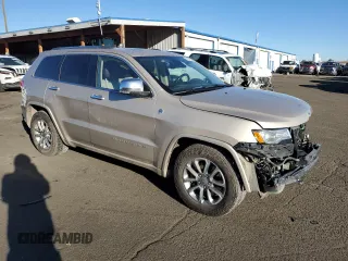 2015 Jeep Grand Cherokee High Altitude with VIN 1C4RJFCM6FC878769, listed as a Copart auction lot 46704755 with 81,727 mi miles and Salvage title. Bid and sale history available at DreamBid. Image 4.