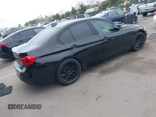 2018 BMW 3 Series 320i with VIN WBA8E1G54JNU93257, listed as a IAAI auction lot 41719141 with 144,381 mi miles. Bid and sale history available at carsss.com. Image 4.