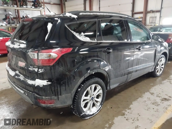 2017 Ford Escape SE with VIN 1FMCU9GD8HUE81307, listed as a IAAI auction lot 41386675 with 133,821 mi miles and . Bid and sale history available at DreamBid. Image 4.