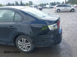 2015 Volkswagen Jetta S with VIN 3VW2K7AJ4FM354917, listed as a IAAI auction lot 42299798 with 186,048 mi miles and . Bid and sale history available at DreamBid. Image 6.