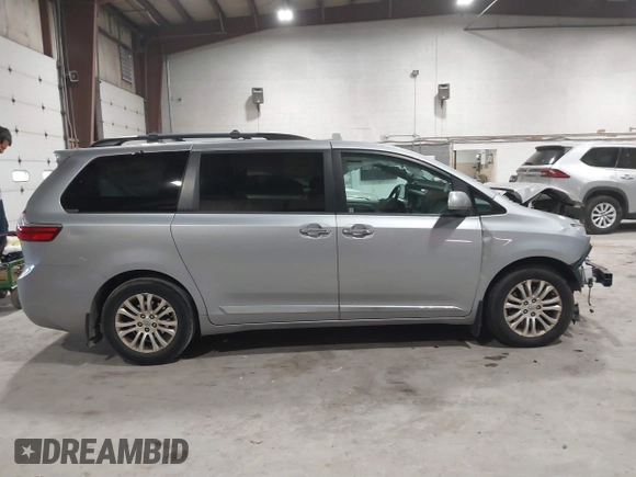 2016 Toyota Sienna XLE with VIN 5TDYK3DC7GS748075, listed as a IAAI auction lot 41795318 with 153,913 mi miles. Bid and sale history available at carsss.com. Image 14.