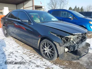 2014 Cadillac CTS Luxury AWD with VIN 1G6AX5SX4E0129537, listed as a IAAI auction lot 41351557 with 70,147 mi miles and . Bid and sale history available at carsss.com. Image 1.