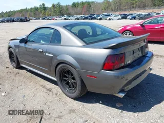 2004 Ford Mustang GT Deluxe with VIN 1FAFP42X44F142786, listed as a IAAI auction lot 42095619 with 100,020 mi miles and . Bid and sale history available at DreamBid. Image 3.