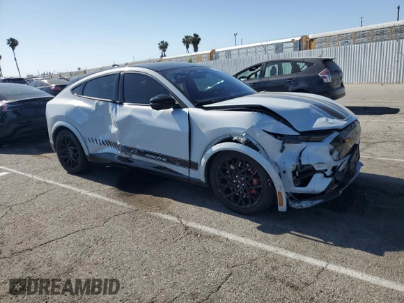 2023 Ford Mustang Mach-E GT with VIN 3FMTK4SX9PMA43974, listed as a Copart auction lot 57683925 with 50,839 mi miles and Salvage title. Bid and sale history available at DreamBid. Image 4.