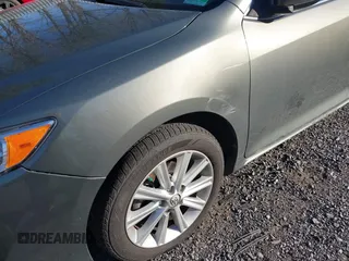 2014 Toyota Camry L with VIN 4T4BF1FK6ER393445, listed as a IAAI auction lot 42044946 with 130,169 mi miles. Bid and sale history available at carsss.com. Image 6.