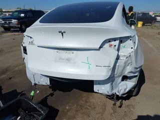 2022 Tesla Model Y Long Range with VIN 7SAYGDEE1NF364241, listed as a IAAI auction lot 42190272 with 54,878 mi miles and . Bid and sale history available at DreamBid. Image 6.