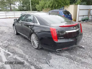 2014 Cadillac XTS Luxury z VIN 2G61N5S38E9292684, wystawiony jako IAAI lot #41842596 z przebiegiem 130 318 mil mil oraz . Historia ofert i sprzedaży dostępna na DreamBid. Obrazek 3.