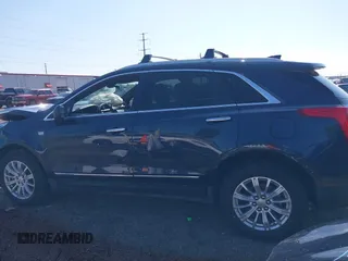 2018 Cadillac XT5 FWD with VIN 1GYKNARS7JZ206816, listed as a IAAI auction lot 42235546 with 94,125 mi miles and . Bid and sale history available at DreamBid. Image 14.