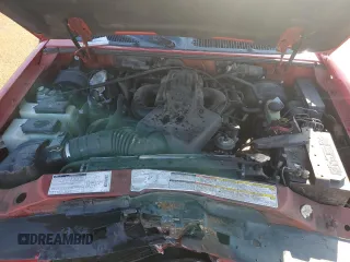 1999 Ford Explorer with VIN 1FMYU22E5XUC72067, listed as a Copart auction lot 79531894 with 109,134 mi miles and Salvage title. Bid and sale history available at DreamBid. Image 12.