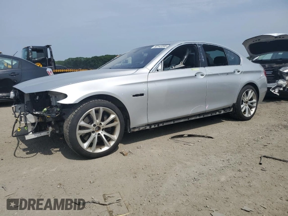 2014 BMW 5 Series 535i xDrive with VIN WBA5B3C5XED530918, listed as a Copart auction lot 60143395 with 104,784 mi miles and Clean title. Bid and sale history available at DreamBid. Image 1.
