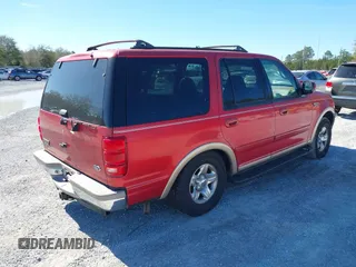 1998 Ford Expedition XLT with VIN 1FMRU17L1WLA47560, listed as a IAAI auction lot 41714605 with 121,523 mi miles. Bid and sale history available at carsss.com. Image 4.