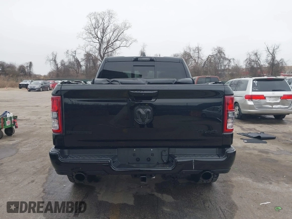 2022 Ram 1500 Big Horn with VIN 1C6SRFFT3NN287385, listed as a IAAI auction lot 41793596 with 12,277 mi miles and . Bid and sale history available at DreamBid. Image 17.