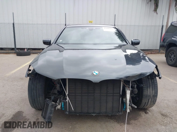 2019 BMW 7 Series 750i with VIN WBA7F0C50KGM26010, listed as a IAAI auction lot 42188421 with 71,576 mi miles and . Bid and sale history available at DreamBid. Image 6.