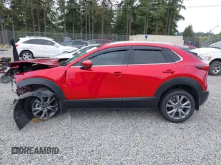2023 Mazda CX-30 S Premium with VIN 3MVDMBDM1PM520048, listed as a IAAI auction lot 42468172 with 7,277 mi miles and . Bid and sale history available at DreamBid. Image 15.
