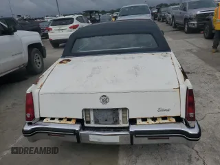 1984 Cadillac Eldorado z VIN 1G6AL5783EE654296, wystawiony jako Copart lot #74945374 z przebiegiem 37 040 mil mil oraz Szkody całkowita. Historia ofert i sprzedaży dostępna na DreamBid. Obrazek 6.