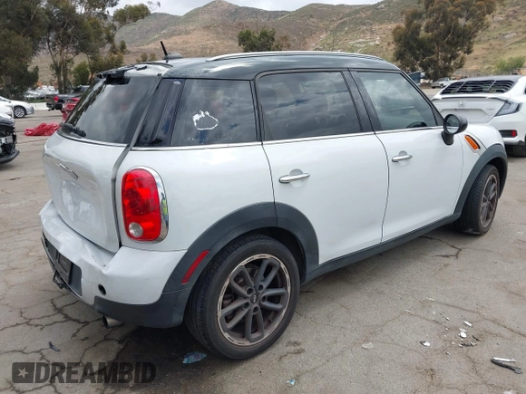 2015 MINI Countryman with VIN WMWZB3C57FWR46707, listed as a IAAI auction lot 42114457 with 137,356 mi miles and . Bid and sale history available at DreamBid. Image 4.