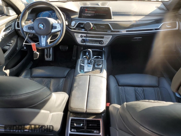 2019 BMW 7 Series M760i xDrive with VIN WBA7H6C55KG615037, listed as a Copart auction lot 80218404 with 43,405 mi miles and Salvage Title. Bid and sale history available at carsss.com. Image 8.