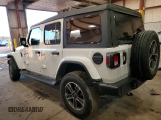 2023 Jeep Wrangler Sahara with VIN 1C4HJXEN1PW659600, listed as a Copart auction lot 85228074 with 21,623 mi miles and Salvage Title. Bid and sale history available at carsss.com. Image 2.