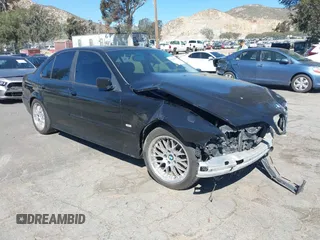 2001 BMW 5 Series 530iA with VIN WBADT63421CF01580, listed as a IAAI auction lot 41626798 with 146,647 mi miles. Bid and sale history available at carsss.com. Image 1.