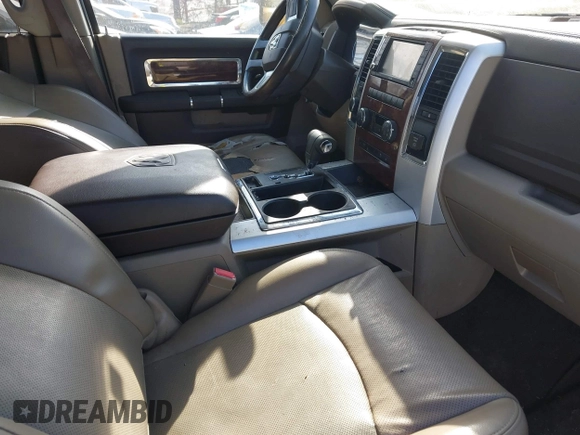 2010 Dodge 1500 SLT with VIN 1D7RV1CT6AS119686, listed as a IAAI auction lot 41671468 with 306,952 mi miles and . Bid and sale history available at DreamBid. Image 5.