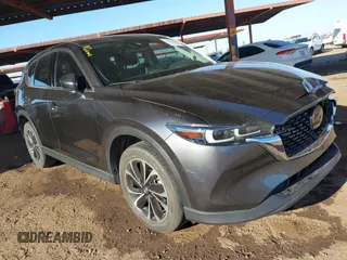 2022 Mazda CX-5 2.5 S Premium Package with VIN JM3KFBDM4N1541805, listed as a IAAI auction lot 41372176 with 33,756 mi miles. Bid and sale history available at carsss.com. Image 1.