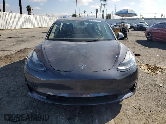 2023 Tesla Model 3 with VIN 5YJ3E1EA3PF541593, listed as a Copart auction lot 43926455 with 26,593 mi miles and Salvage title. Bid and sale history available at DreamBid. Image 5.