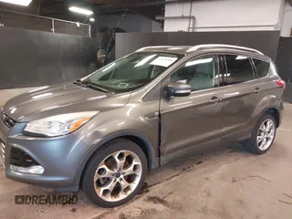 2014 Ford Escape Titanium with VIN 1FMCU9JX0EUE45254, listed as a IAAI auction lot 42038700 with 60,103 mi miles. Bid and sale history available at carsss.com. Image 6.