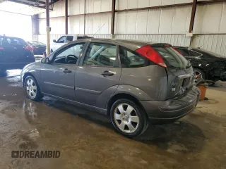 2002 Ford Focus ZX5 z VIN 3FAFP37352R180981, wystawiony jako Copart lot #55856125 z przebiegiem 59 785 mil mil oraz Szkoda całkowita • Salvage title. Historia ofert i sprzedaży dostępna na DreamBid. Obrazek 2.