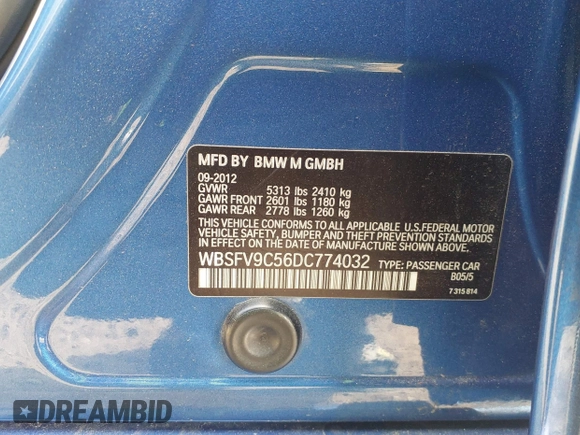 2013 BMW M5 with VIN WBSFV9C56DC774032, listed as a IAAI auction lot 42124754 with 55,409 mi miles. Bid and sale history available at carsss.com. Image 9.