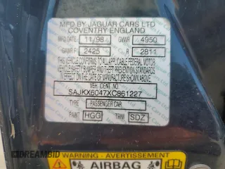 1999 Jaguar XJ with VIN SAJKX6047XC861227, listed as a Copart auction lot 75007414 with Not provided miles and Salvage title. Bid and sale history available at DreamBid. Image 13.