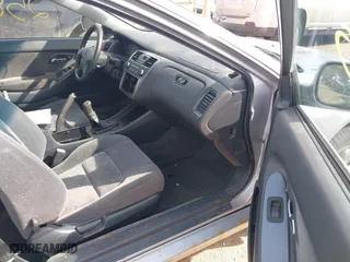 2001 Honda Accord Cpe EX with VIN 1HGCG31571A005892, listed as a IAAI auction lot 42022588 with 202,497 mi miles. Bid and sale history available at carsss.com. Image 5.