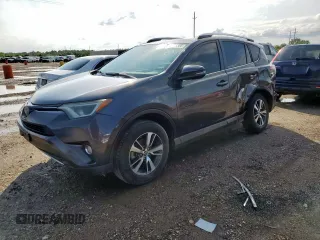 2018 Toyota RAV4 XLE with VIN JTMWFREV1JJ740492, listed as a Copart auction lot 60555305 with 147,148 mi miles and Salvage title. Bid and sale history available at DreamBid. Image 1.