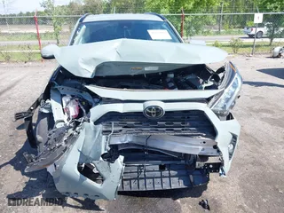 2021 Toyota RAV4 XLE with VIN JTMW1RFV8MD077146, listed as a IAAI auction lot 41970860 with 22,029 mi miles. Bid and sale history available at carsss.com. Image 6.