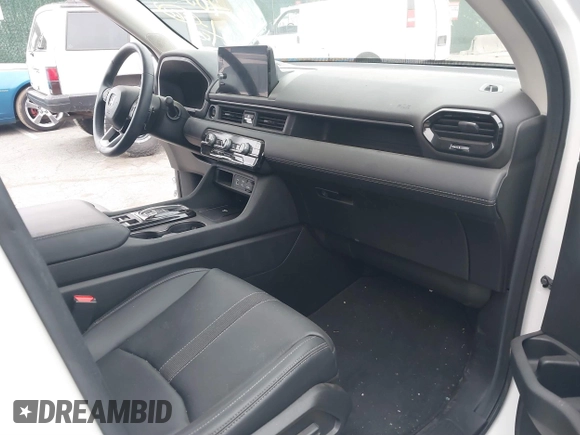 2023 Honda Pilot EX-L with VIN 5FNYG1H58PB016138, listed as a IAAI auction lot 40591717 with 10,068 mi miles and . Bid and sale history available at DreamBid. Image 5.