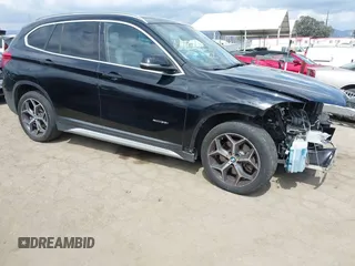 2017 BMW X1 xDrive28i with VIN WBXHT3C30H5F67797, listed as a IAAI auction lot 42261994 with 159,155 mi miles and . Bid and sale history available at DreamBid. Image 1.