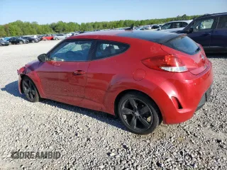 2014 Hyundai Veloster z VIN KMHTC6AD8EU213234, wystawiony jako Copart lot #53297535 z przebiegiem 131 769 mil mil oraz Szkoda całkowita • Salvage title. Historia ofert i sprzedaży dostępna na DreamBid. Obrazek 2.