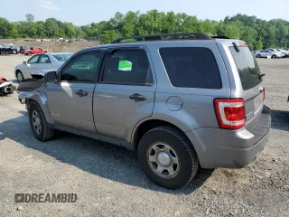 2008 Ford Escape XLS with VIN 1FMCU02Z18KE11979, listed as a Copart auction lot 60212165 with 239,177 mi miles and Salvage title. Bid and sale history available at DreamBid. Image 2.
