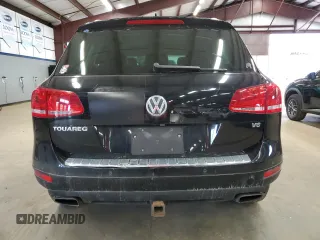 2012 Volkswagen Touareg Sport z VIN WVGEF9BP9CD011879, wystawiony jako Copart lot #56903035 z przebiegiem 198 262 mil mil oraz Czysty tytuł • Clean title. Historia ofert i sprzedaży dostępna na DreamBid. Obrazek 6.