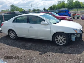 2007 Toyota Avalon XL z VIN 4T1BK36B07U187140, wystawiony jako IAAI lot #42333928 z przebiegiem 119 924 mil mil oraz . Historia ofert i sprzedaży dostępna na DreamBid. Obrazek 14.