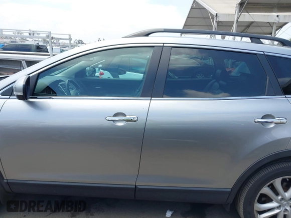 2011 Mazda CX-9 Grand Touring z VIN JM3TB2DA5B0319538, wystawiony jako IAAI lot #42429157 z przebiegiem 88 321 mil mil oraz . Historia ofert i sprzedaży dostępna na DreamBid. Obrazek 15.