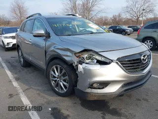 2015 Mazda CX-9 Grand Touring with VIN JM3TB3DA6F0447184, listed as a IAAI auction lot 41771865 with 137,814 mi miles. Bid and sale history available at carsss.com. Image 1.