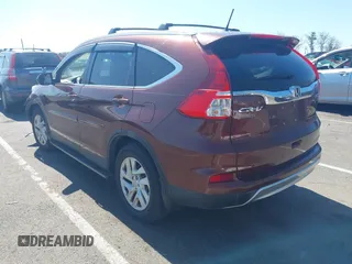 2015 Honda CR-V EX-L with VIN 2HKRM4H74FH616400, listed as a IAAI auction lot 42059162 with 120,636 mi miles and . Bid and sale history available at DreamBid. Image 3.