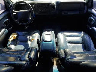 1997 GMC Yukon with VIN 1GKEK13R0VJ747359, listed as a Copart auction lot 48301095 with 272,417 mi miles and Salvage Title. Bid and sale history available at carsss.com. Image 8.
