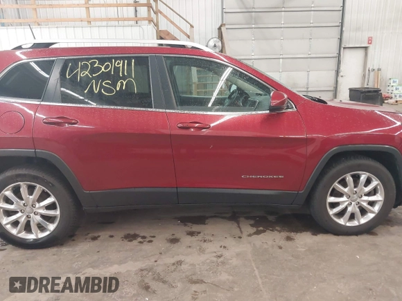 2016 Jeep Cherokee Limited with VIN 1C4PJMDB0GW337600, listed as a IAAI auction lot 42301911 with 163,441 mi miles and . Bid and sale history available at DreamBid. Image 14.