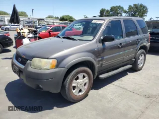 2002 Ford Escape XLT Choice with VIN 1FMYU04182KB99540, listed as a Copart auction lot 61493365 with 156,207 mi miles and Salvage title. Bid and sale history available at DreamBid. Image 1.