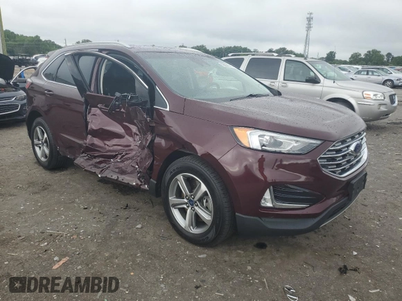 2019 Ford Edge SEL with VIN 2FMPK4J92KBB34891, listed as a Copart auction lot 60050945 with 104,942 mi miles and Salvage title. Bid and sale history available at DreamBid. Image 4.