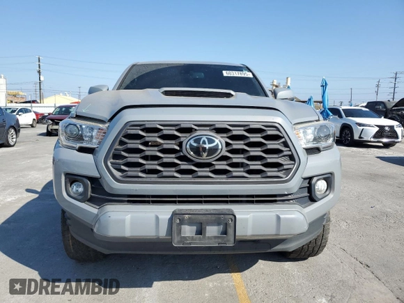 2020 Toyota Tacoma SR5 with VIN 3TMAZ5CN2LM137991, listed as a Copart auction lot 60317895 with 98,054 mi miles and Salvage title. Bid and sale history available at DreamBid. Image 5.