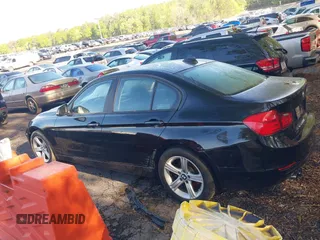 2015 BMW 3 Series 328i with VIN WBA3A5C59FF609332, listed as a IAAI auction lot 41994091 with 194,245 mi miles. Bid and sale history available at carsss.com. Image 14.