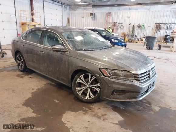 2021 Volkswagen Passat 2.0T SE with VIN 1VWSA7A30MC000721, listed as a IAAI auction lot 41614367 with 98,621 mi miles. Bid and sale history available at carsss.com. Image 1.