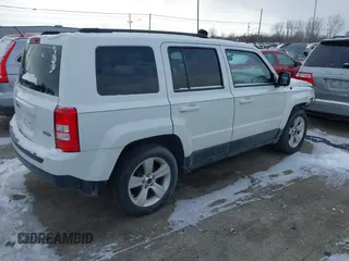 2014 Jeep Patriot Latitude with VIN 1C4NJPFA6ED502457, listed as a IAAI auction lot 41334385 with 160,600 mi miles and . Bid and sale history available at carsss.com. Image 4.